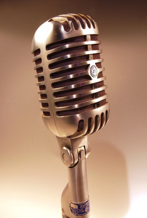 vintage microphone: Ernesto Morales-Ramos does creative work for audio, podcasts, and broadcast radio